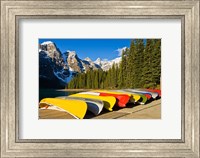 Moraine Lake and rental canoes stacked, Banff National Park, Alberta, Canada Fine Art Print