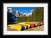 Moraine Lake and rental canoes stacked, Banff National Park, Alberta, Canada Fine Art Print