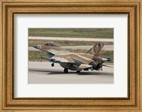 An F-16C Barak of the Israeli Air Force landing at Hatzor Air Force Base Fine Art Print