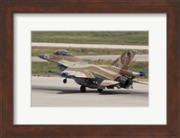 An F-16C Barak of the Israeli Air Force landing at Hatzor Air Force Base Fine Art Print