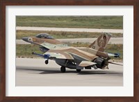 An F-16C Barak of the Israeli Air Force landing at Hatzor Air Force Base Fine Art Print