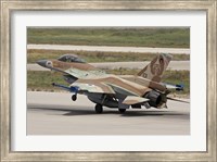 An F-16C Barak of the Israeli Air Force landing at Hatzor Air Force Base Fine Art Print