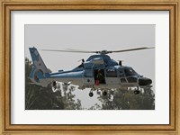 An AS-565 Atalef of the Israeli Air Force in a rescue demonstration Fine Art Print
