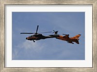 An F-16 Falcon and AH-64 Apache from the Royal Netherlands Air Force Fine Art Print