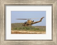 An AH-1S Tzefa attack helicopter of the Israeli Air Force Fine Art Print