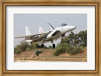 An F-15C Baz of the Israeli Air Force landing at Tel Nof Air Force Base Fine Art Print