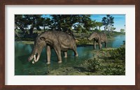 A pair of Platybelodon grazing in a shallow stream Fine Art Print