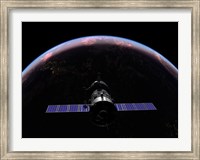 A Soyuz TMA-M spacecraft soars over the Atlantic Ocean at sunset Fine Art Print
