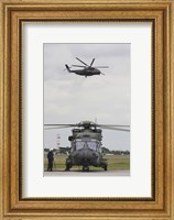 A German Army NH90 and its Predecessor, the CH-53 Sea Stallion Fine Art Print