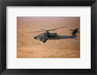 An AH-64D Apache Longbow Fires a Hydra Rocket over Northern Iraq Fine Art Print