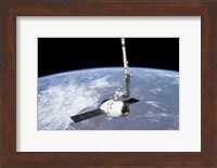 The SpaceX Dragon Cargo Craft in the Grasp of the Canadarm2 Fine Art Print