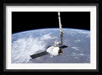 The SpaceX Dragon Cargo Craft in the Grasp of the Canadarm2 Fine Art Print