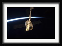 The SpaceX Dragon Cargo Craft with Earth's Horizon in the Background Fine Art Print
