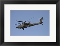 AH-64 Apache in flight over the Baghdad Hotel in central Baghdad, Iraq Fine Art Print
