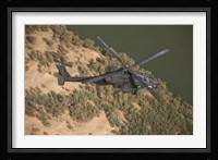 An AH-64D Apache Helicopter in Flight Fine Art Print