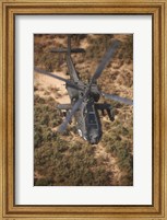 An AH-64D Apache Flying over Northern Iraq Fine Art Print