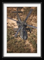 An AH-64D Apache Flying over Northern Iraq Fine Art Print