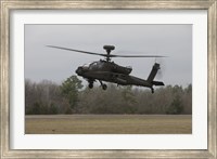 An AH-64 Apache Helicopter in Midair, Conroe, Texas Fine Art Print