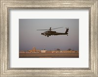 An AH-64D Apache Longbow Block III Flies by the Control Tower on Camp Speicher Fine Art Print