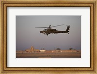 An AH-64D Apache Longbow Block III Flies by the Control Tower on Camp Speicher Fine Art Print