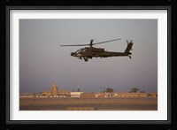 An AH-64D Apache Longbow Block III Flies by the Control Tower on Camp Speicher Fine Art Print