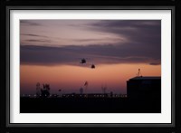 A pair of UH-60 Black Hawk helicopters approach their Landing in Baghdad, Iraq Fine Art Print