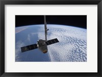 The SpaceX Dragon Cargo Craft Prior to being Released from the Canadarm2 Fine Art Print
