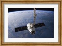 The SpaceX Dragon Cargo Craft Prior to being Released from the Canadarm2 Fine Art Print