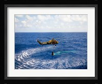 An Astronaut is Rescued by a US Marine Helicopter Fine Art Print