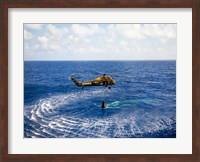 An Astronaut is Rescued by a US Marine Helicopter Fine Art Print