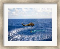 An Astronaut is Rescued by a US Marine Helicopter Fine Art Print