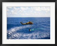 An Astronaut is Rescued by a US Marine Helicopter Fine Art Print