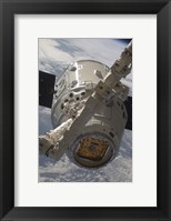 The SpaceX Dragon Commercial Cargo Craft during Grappling Operations with Canadarm2 Fine Art Print