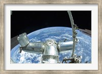 A portion of the International Space Station against Earth's horizon Fine Art Print
