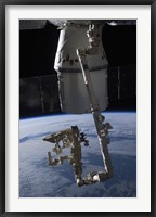 The SpaceX Dragon Commercial Cargo Craft Berthed to the ISS Fine Art Print