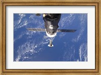 Space Shuttle Discovery approaches the International Space Station Fine Art Print