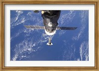 Space Shuttle Discovery approaches the International Space Station Fine Art Print