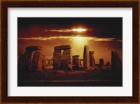 Composite of a Sunset over Stonehenge, Wiltshire, England Fine Art Print
