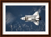 Aerial view of Space Shuttle Discovery over Earth Fine Art Print