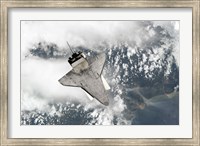 The Underside of Space Shuttle Discovery as the Shuttle approaches the International Space Station Fine Art Print