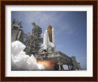 An Exhaust Plume forms under the Mobile Launcher Platform on Launch Pad 39A as Space Shuttle Atlantis lifts off into Orbit Fine Art Print