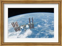 The International Space Station backdropped by Earth's Horizon Fine Art Print