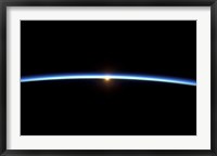 The Thin line of Earth's Atmosphere and the Setting Sun Fine Art Print