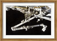 The Canadian-Built Space Station Remote Manipulator System (Canadarm2), during Undocking AWctivities Fine Art Print