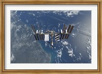 The International Space Station above Earth Fine Art Print