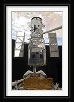 The Hubble Space Telescope is Released from the Cargo Bay of Space Shuttle Atlantis Fine Art Print