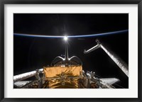 Space Shuttle Atlantis' Payload Bay Backdropped by a Blue and White Earth Fine Art Print