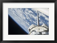 Partial view of Space Shuttle Endeavour Backdropped against Earth Fine Art Print
