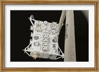 The Japanese Experiment Module Exposed Facility in the Grasp of the Shuttle's Remote Manipulator System Arm Fine Art Print
