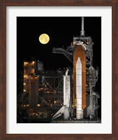 A Nearly full Moon Sets as Space Shuttle Discovery Sits Atop the Launch Pad Fine Art Print